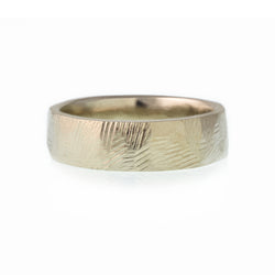 Gender Neutral hand made wedding band designed by Susan Crow for East Fourth Street Jewelry is ethically made and comfortable to wear.