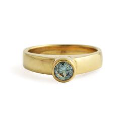 East Fourth Street Jewelry, Montana Sapphire bezel set in white or yellow gold. Hand carved and cast by designer.